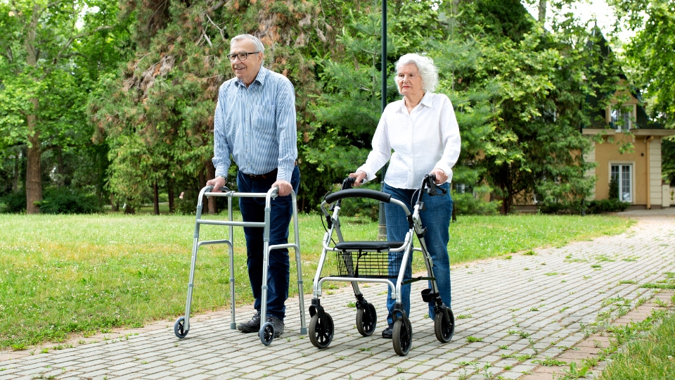 Seniors using walkers and rollators